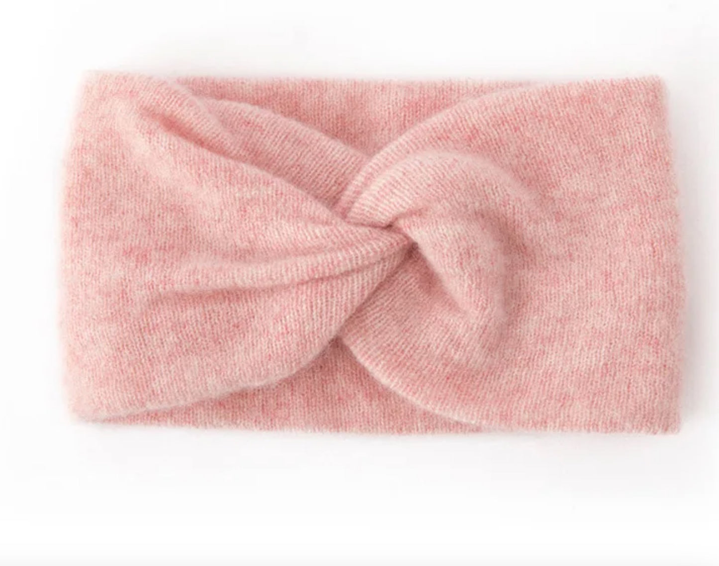 Pink cashmere knotted headband on a white background