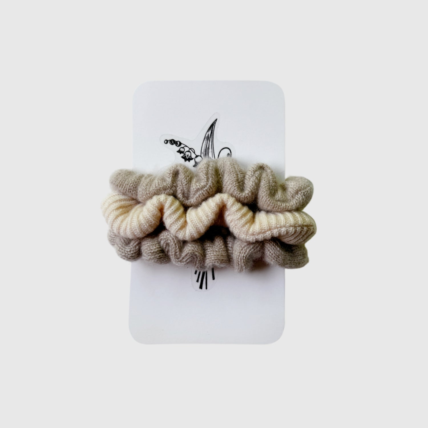 neutral scrunchies in 100% cashmere