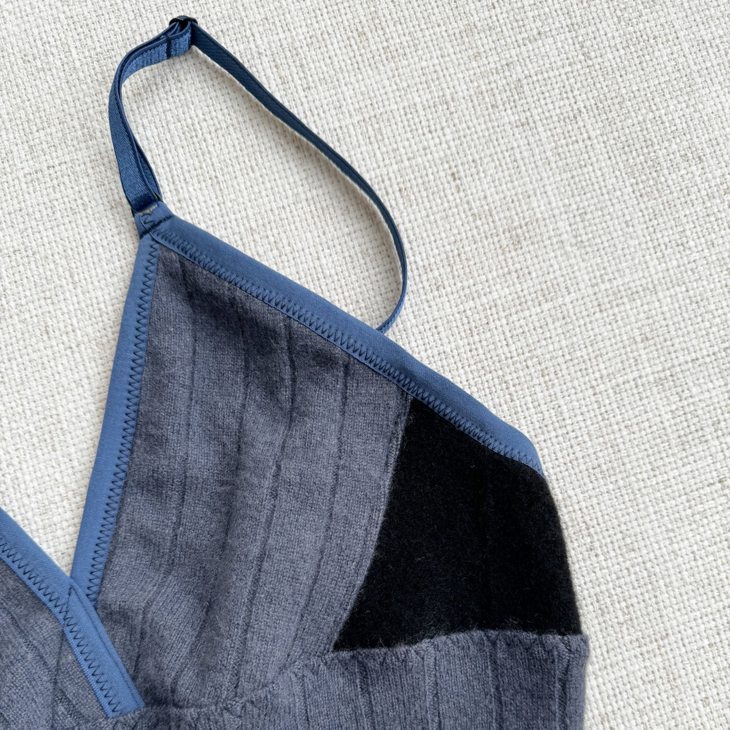 Handmade in Canada by Econica, long cashmere bra top, refined Dusty Blue and Black palette, premium cashmere material, artisanal quality, elegant and cozy, soft-to-the-touch, perfect for layering, sustainable choice, durable construction, stylish loungewear