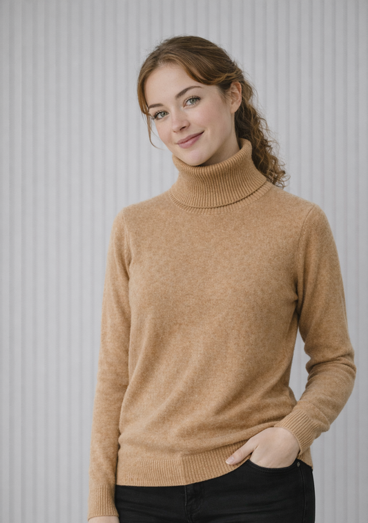 Woman wearing a brown turtleneck sweater against a light gray background
