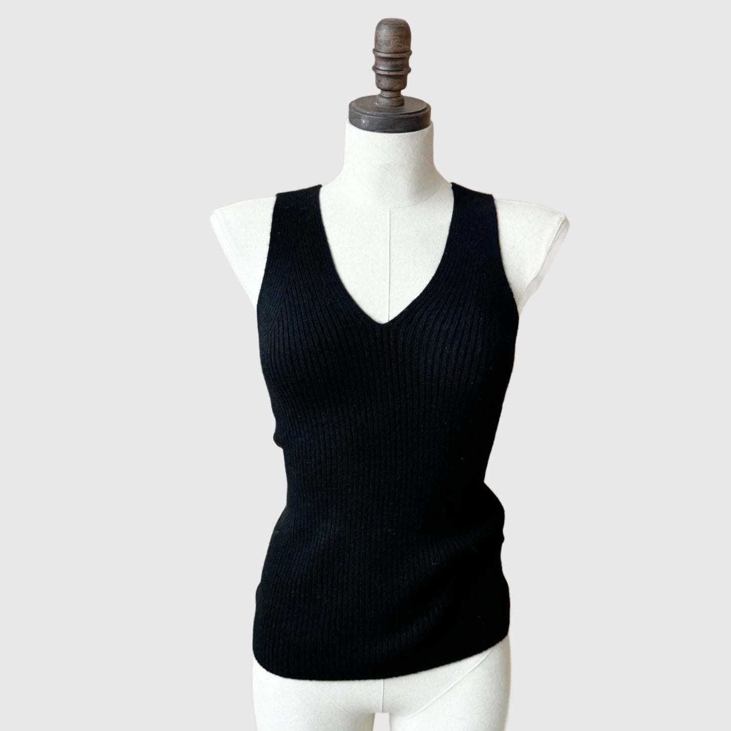 cashmere camisole, ribbed knit top, luxury loungewear, soft cashmere tank, fitted cashmere top, V-neck camisole, breathable knitwear, elegant layering piece, cozy cashmere clothing, minimalist fashion