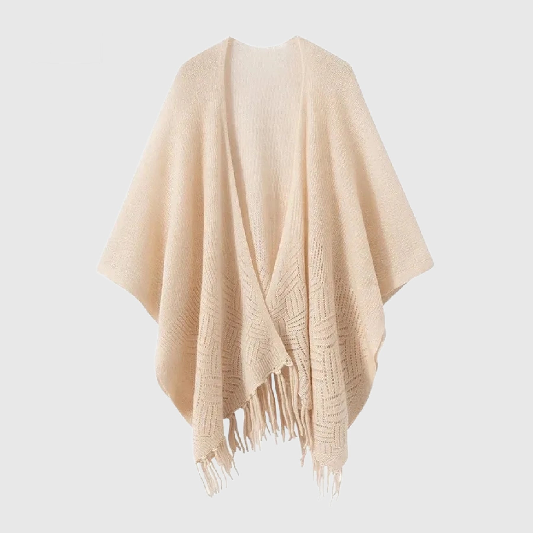 Beige poncho with fringe on a light gray background