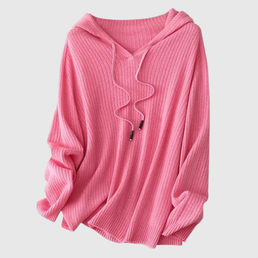 The Merino Wool Hoodie Top for Women by Econica is a high-quality garment crafted from pure merino wool.