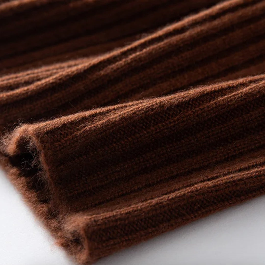 Close-up of a brown knitted fabric on a white background