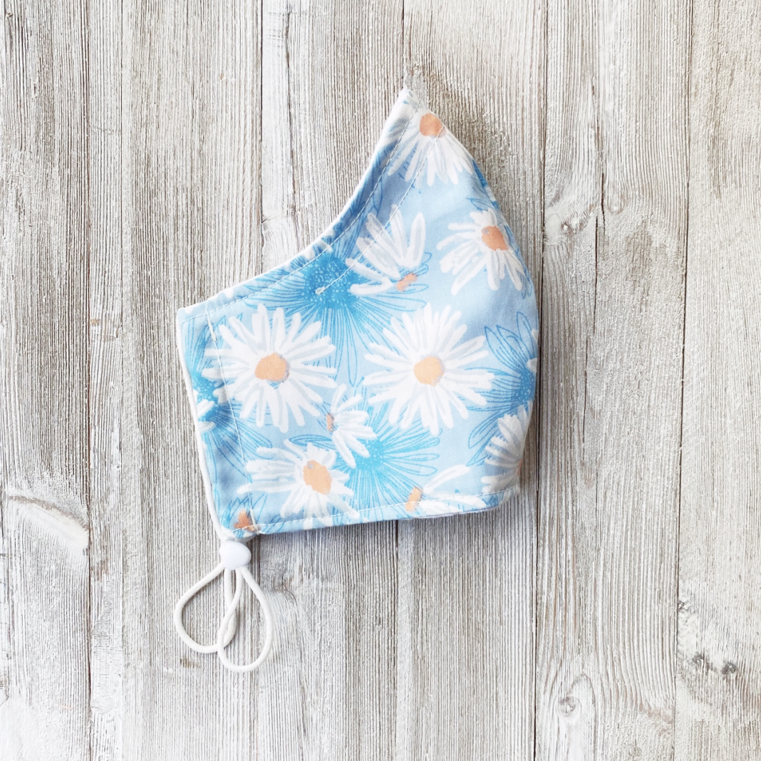 fitted face mask with daisy print | Buy organic cotton face masks | Shop made in Canada face masks | Silk, cotton and linen face masks from Canada 